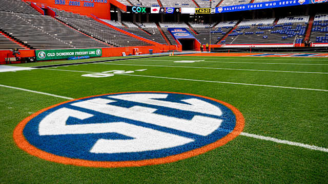 The SEC logo in orange and blue colors is painted on the field before the game between the Florida Gators and Arkansas Razorbacks at Steve Spurrier Field at Ben Hill Griffin Stadium in Gainesville, FL on Saturday, November 4, 2023. [Matt Pendleton/Gainesville Sun]